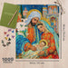 This Springbok A King is Born 1000 Piece Jigsaw Puzzle features rich, detailed artwork of the birth of Jesus.
