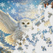 The Springbok Arctic Owl 1000 Piece Jigsaw Puzzle features stunning, high-detail artwork of a majestic snowy owl. 