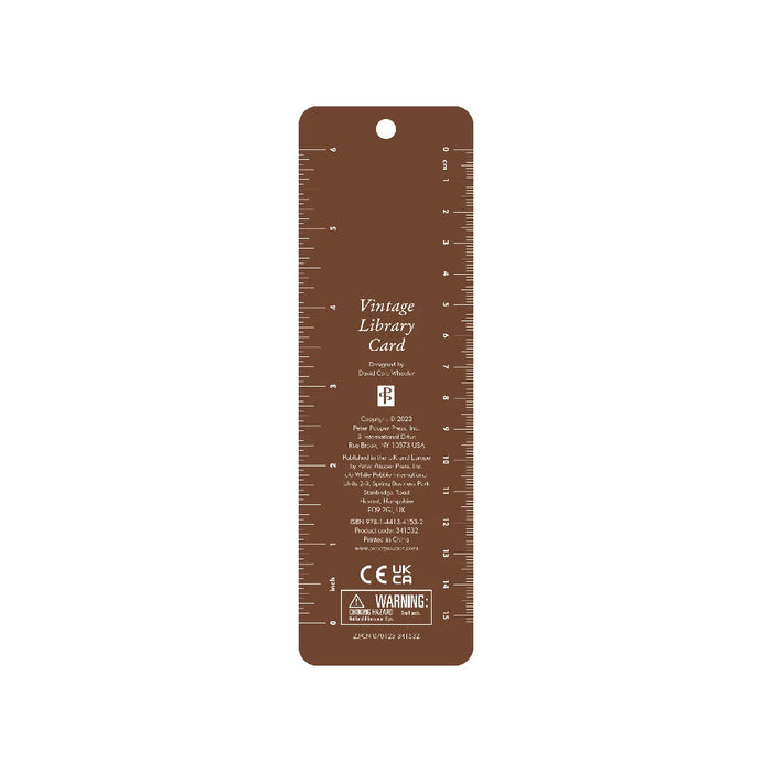 A book with a stylish tassel and a name tag, highlighting its unique identity.