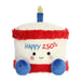 A stuffed cake decorated with the words "Happy 25th" in colorful icing.
