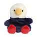 A plush bald eagle toy sitting on a plain white background, showcasing its detailed feathers and beak.