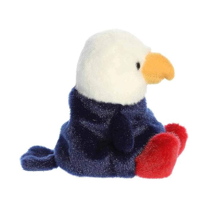 A soft toy bald eagle against a white backdrop, highlighting its vibrant colors and lifelike appearance.
