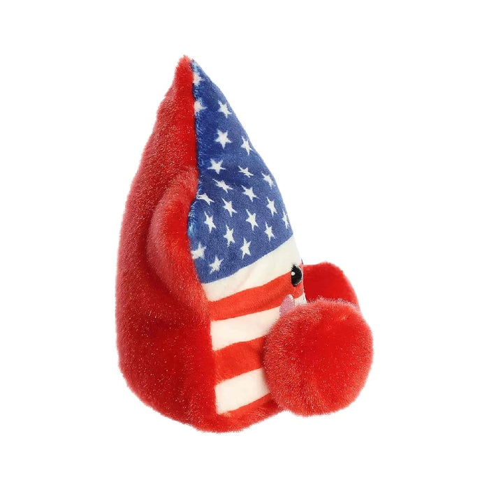 A star-shaped plush toy with a red, white, and blue design, ideal for kids or as a festive decoration.