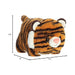 A cute stuffed tiger sitting on a bright white background.