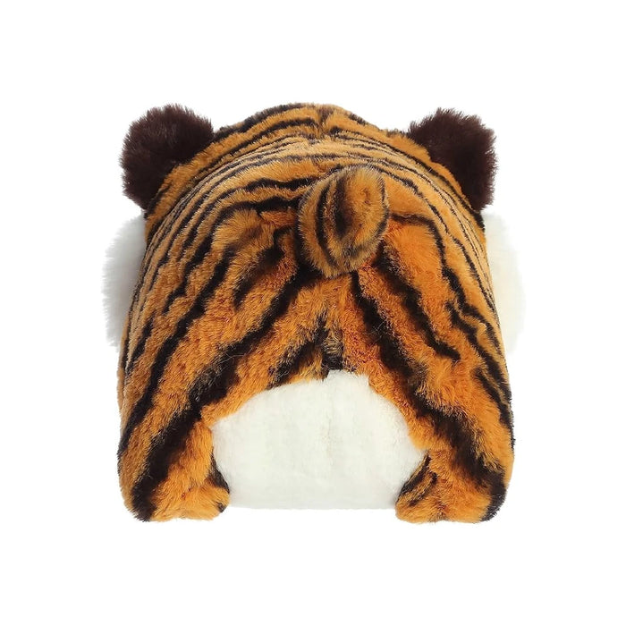 A stuffed tiger toy positioned on a clean white surface.
