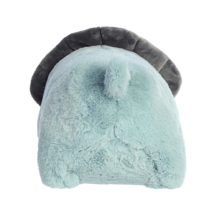 A soft blue stuffed animal adorned with horns, offering a whimsical touch to children's toys.