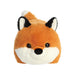 A plush fox toy resting on its side, showcasing its soft fur and playful expression.