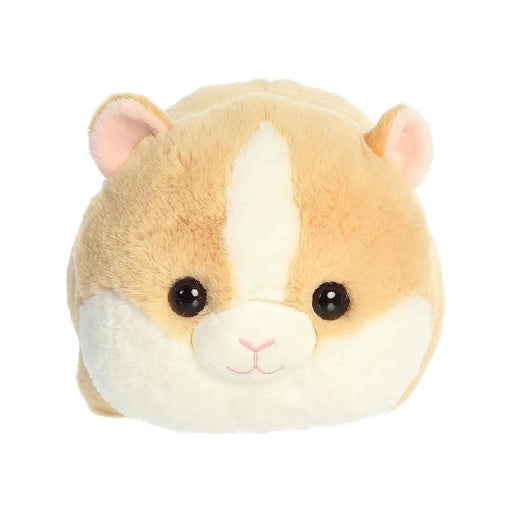 A stuffed hamster sits on a plain white background, showcasing its soft fur and small, round features.