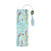 A colorful butterfly-shaped bookmark resting on an open book page, adding a whimsical touch to reading.