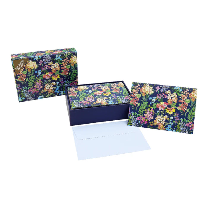 A blue box adorned with colorful flowers, showcasing a vibrant and decorative design.