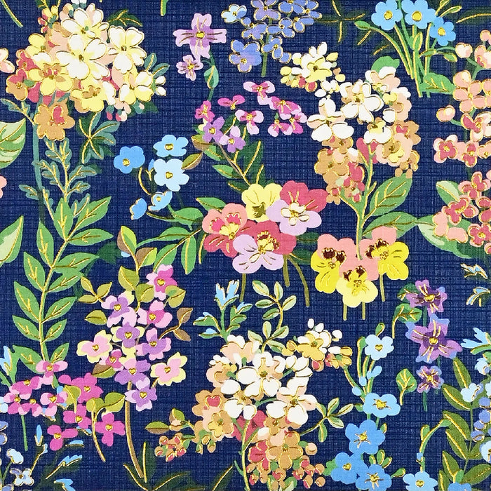 A blue box decorated with various flowers, creating a cheerful and artistic look.