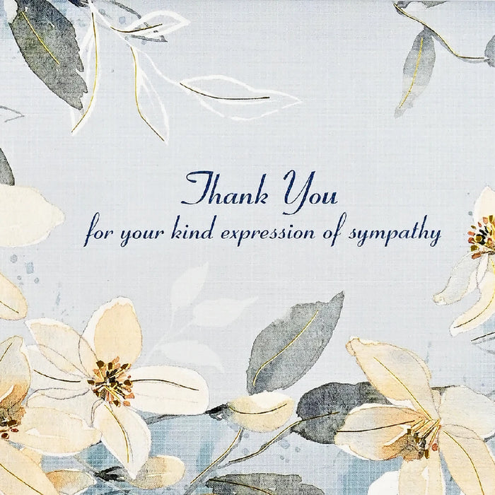 A floral thank you card and matching envelope displayed together, showcasing a vibrant design.