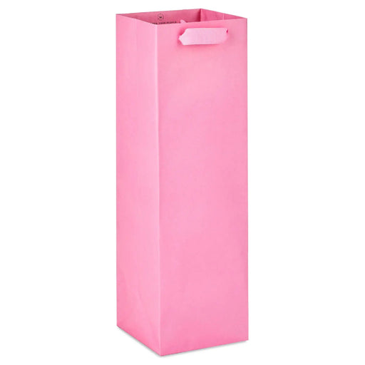 Tall medium‑pink wine gift bag with matte finish and grosgrain ribbon handles