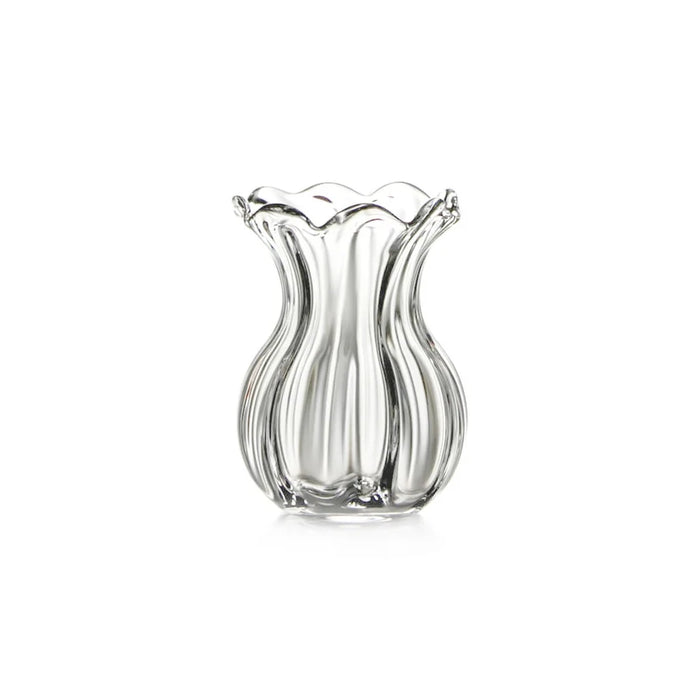 A clear glass vase featuring a wavy design, showcasing its elegant and fluid shape.