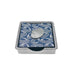 A square box with a shiny silver coin resting on top, highlighting its metallic surface and smooth edges.