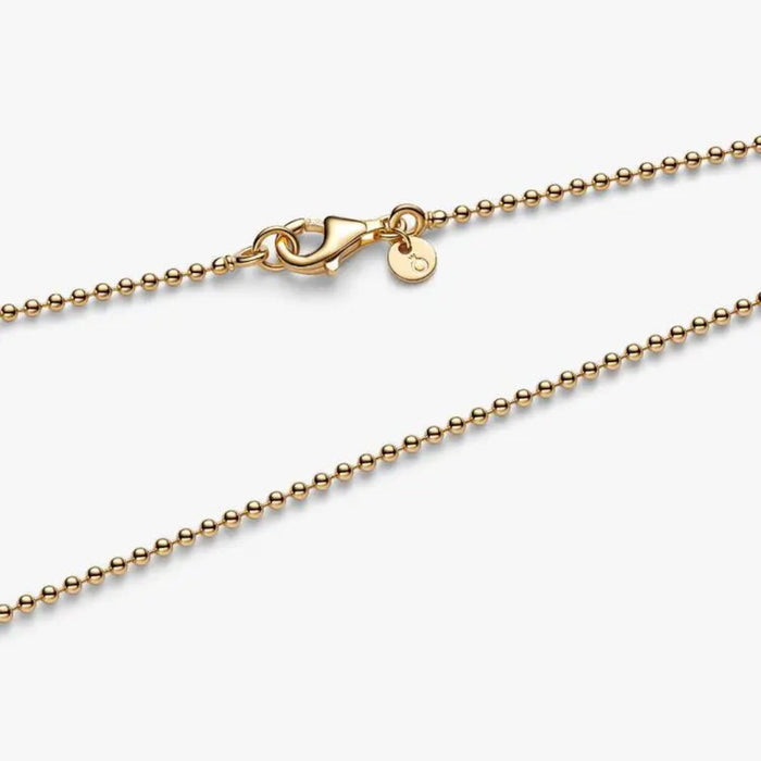 Close-up of the Pandora Ball Chain Necklace in 14k gold plating showing the textured beaded chain.