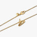 Close‑up of 14k gold‑plated openwork heart pendant with diamond‑cut chain and clasp visible