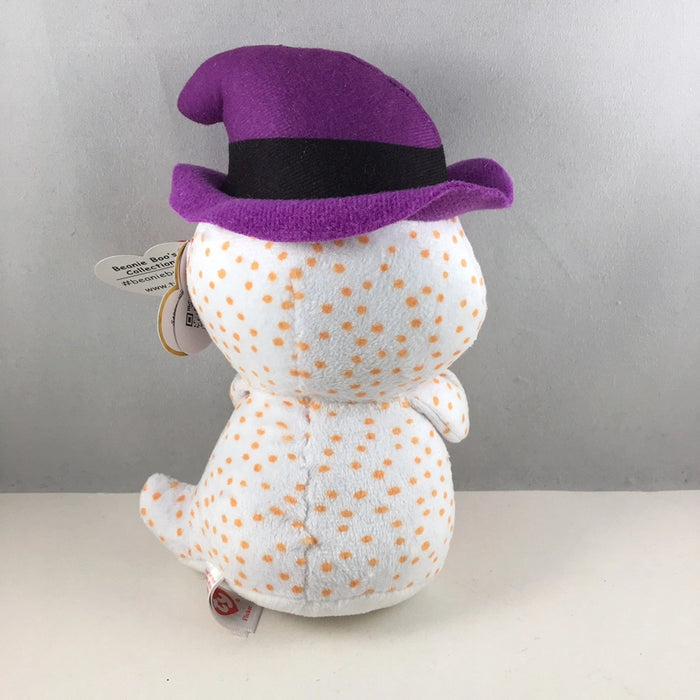 Plush toy with a purple hat on a gray background