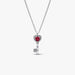 Close-up of the Pandora Elevated Heart Key Collier Necklace in sterling silver showing a heart key pendant with red crystal and sparkling halo on a white background.