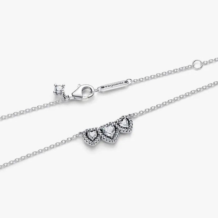 Pandora Halo Heart Trilogy Collier Necklace in sterling silver on a white background.