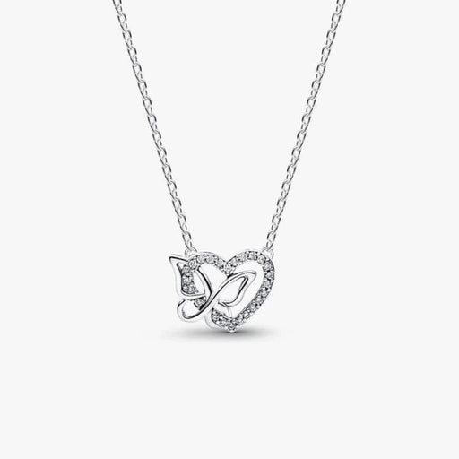 Silver necklace with a heart and butterfly shaped charm on a white background