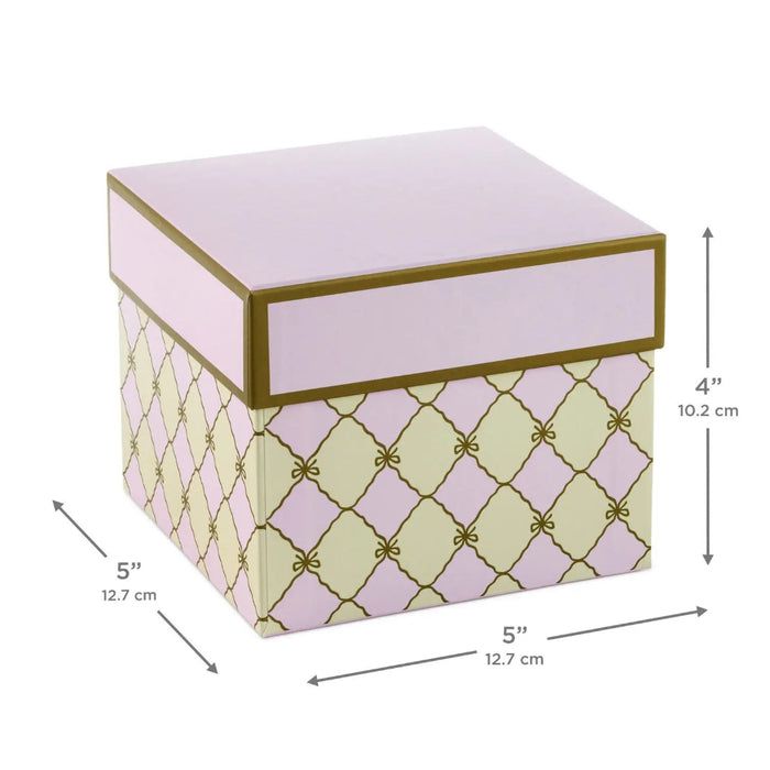 Medium pink patterned gift box with gold trim, 5" × 4" × 5"