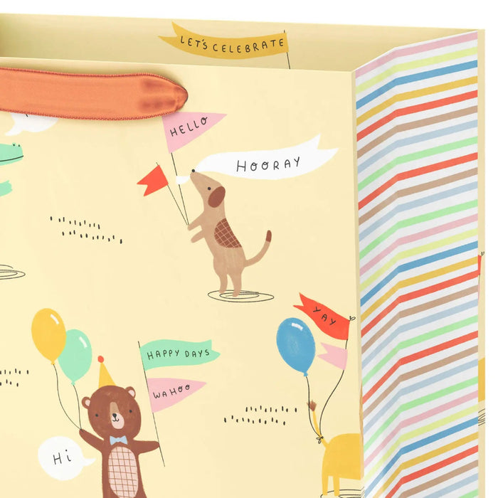 Close‑up of yellow animal‑party gift bag