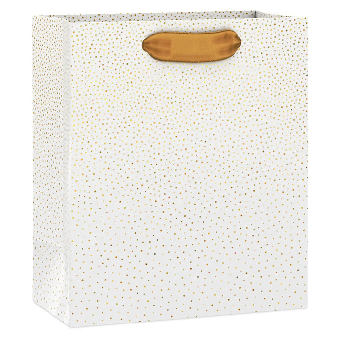 Small cream gift bag with scattered gold foil dots and satin ribbon handles