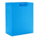 Hallmark 9.6-inch solid royal blue medium gift bag with a vibrant matte finish, sturdy carrying handles, and a classic design for birthdays, holidays, graduations, and special occasions.