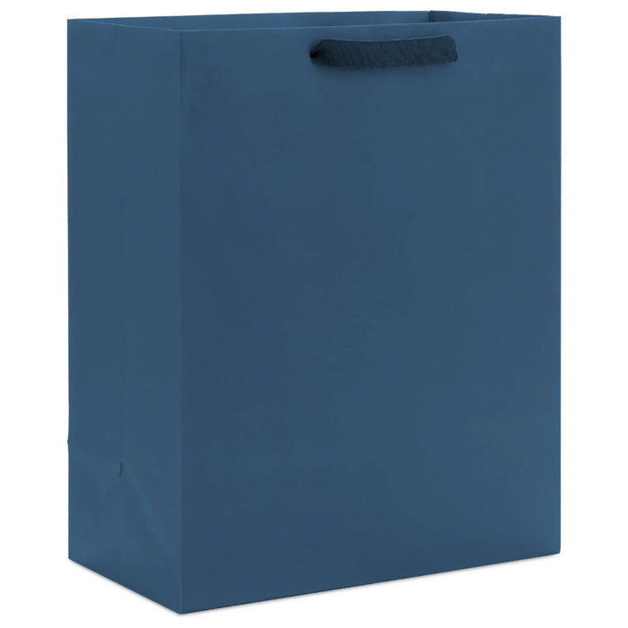 Hallmark 13-inch navy blue large gift bag with solid color matte finish for birthdays and special occasions