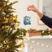 Hallmark Loungefly Disney Stitch Backpack ornament featuring a miniature backpack design with Stitch from Disney's Lilo &amp; Stitch for Christmas tree decorating and Disney collections.