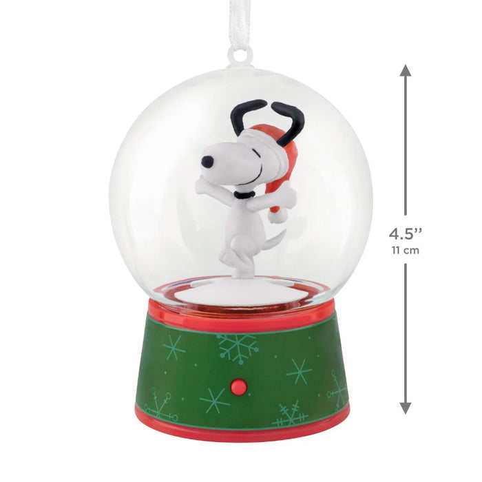 Hallmark Peanuts Snoopy musical snow globe Christmas ornament with swirling snow, festive holiday music, motion, and hanger attachment.
