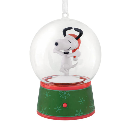 Hallmark Peanuts Snoopy musical snow globe Christmas ornament with swirling snow, festive holiday music, motion, and hanger attachment.