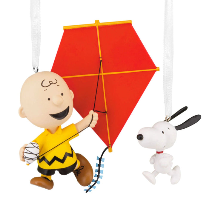 Peanuts® Charlie Brown and Snoopy Hallmark Ornaments Set of 2 featuring classic Peanuts characters in festive holiday designs for Christmas tree decorating and collectible holiday displays.