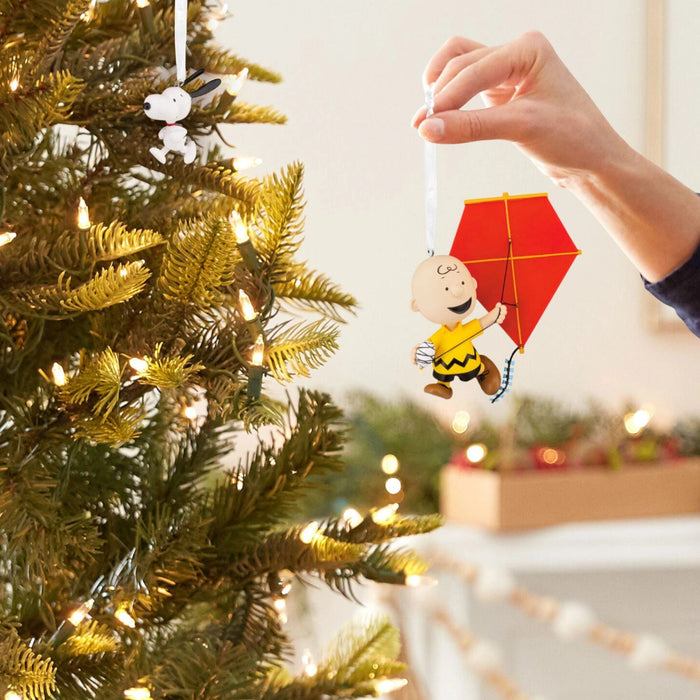 Peanuts® Charlie Brown and Snoopy Hallmark Ornaments Set of 2 featuring classic Peanuts characters in festive holiday designs for Christmas tree decorating and collectible holiday displays.
