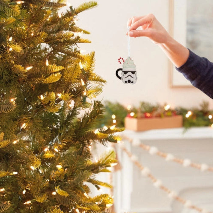 This Hallmark Star Wars™ Stormtrooper™ Festive Mug Hallmark Ornament brings galactic fun to your holiday décor with a creative mug-inspired design featuring the iconic Stormtrooper™.