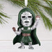 Hallmark Marvel Studios Avengers: Doomsday Doctor Doom resin Christmas ornament with hanger attachment, measuring 2.25 x 3.25 x 1 inches.