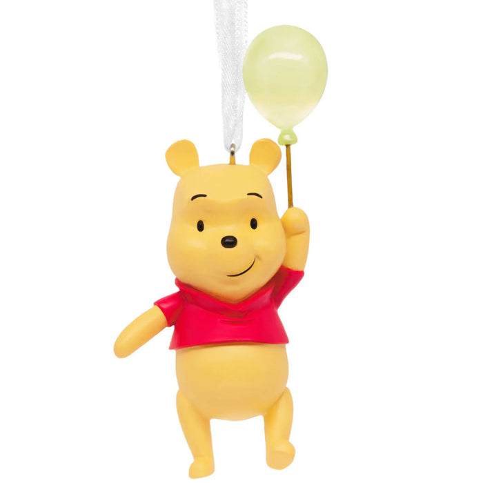 Hallmark Disney Winnie the Pooh™ Christmas ornament featuring Pooh Bear holding a colorful balloon in a detailed resin design, perfect for Disney fans and holiday tree decorating.