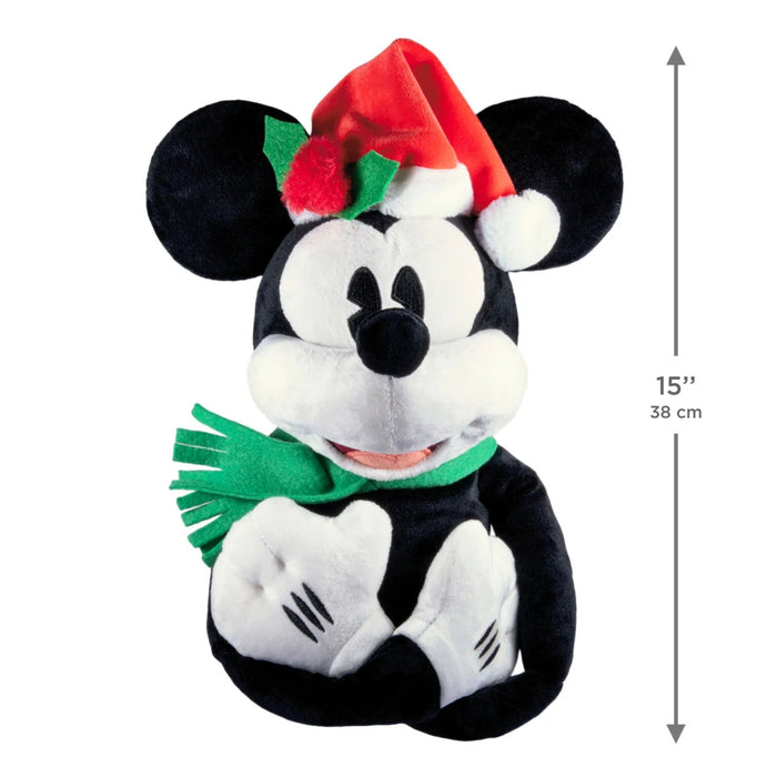 Hallmark Disney Mickey Mouse 15-inch plush Christmas tree topper wearing a red and white Santa hat and green scarf.