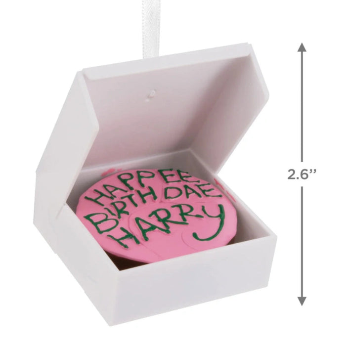 Hallmark Harry Potter™ Birthday Cake Christmas ornament featuring Hagrid's iconic pink birthday cake with green icing, inspired by Harry Potter and the Sorcerer's Stone™.