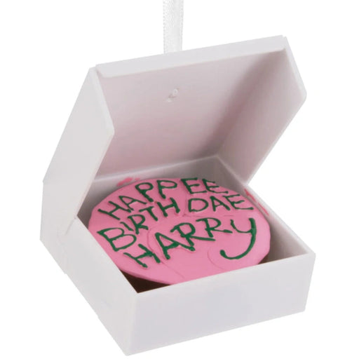 Hallmark Harry Potter™ Birthday Cake Christmas ornament featuring Hagrid's iconic pink birthday cake with green icing, inspired by Harry Potter and the Sorcerer's Stone™.