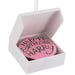 Hallmark Harry Potter™ Birthday Cake Christmas ornament featuring Hagrid's iconic pink birthday cake with green icing, inspired by Harry Potter and the Sorcerer's Stone™.