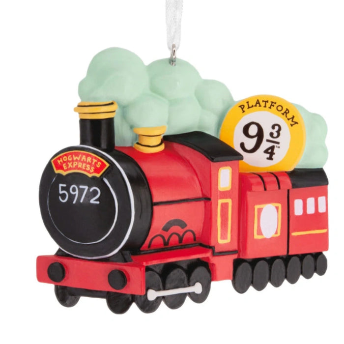 Hallmark Harry Potter Hogwarts Express ornament featuring the iconic red magical train from the Wizarding World, collectible Christmas tree decoration for Harry Potter fans.
