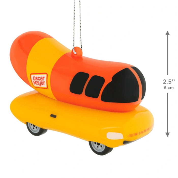 This Hallmark Oscar Mayer™ The Wienermobile® Shatterproof Hallmark Ornament brings a fun and nostalgic touch to your holiday décor with a collectible design inspired by the iconic American food truck. 