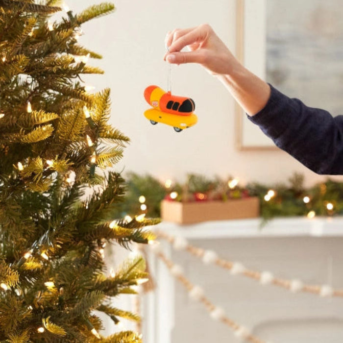 This Hallmark Oscar Mayer™ The Wienermobile® Shatterproof Hallmark Ornament brings a fun and nostalgic touch to your holiday décor with a collectible design inspired by the iconic American food truck. 