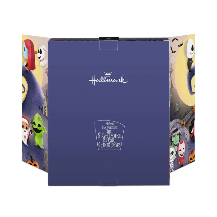 Hallmark Disney Tim Burton’s The Nightmare Before Christmas countdown calendar with 12 miniature shatterproof character ornaments, each 1.75 inches high with hanger attachments.