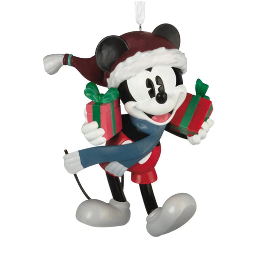 This Hallmark Disney Mickey Mouse With Presents Hallmark Ornament captures the joy of the holiday season with everyone's favorite Disney character.