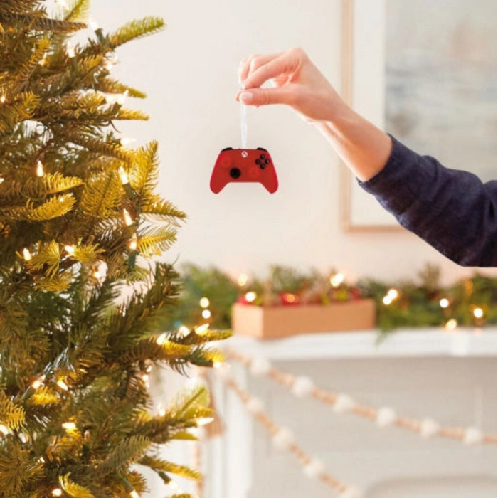 This Hallmark XBOX Pulse Red Video Game Controller Hallmark Ornament is the perfect holiday collectible for gamers and Xbox fans.