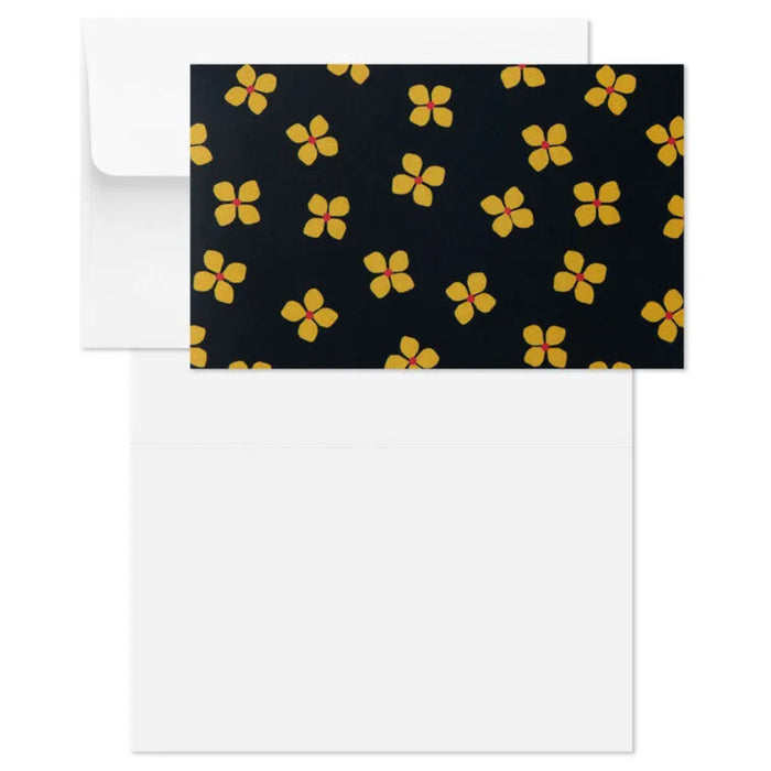 Floral patterned card with a matching envelope on a white background