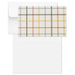 Plaid patterned paper and envelope on a white background